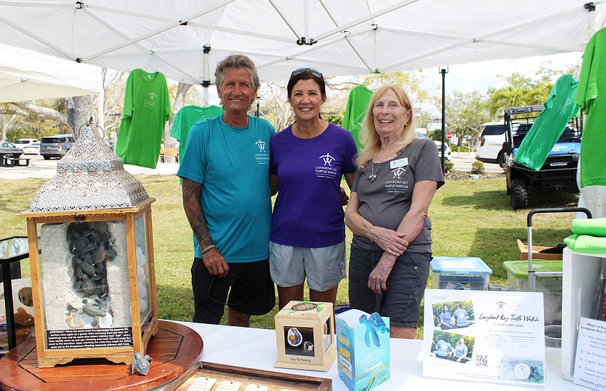 Leo Kissling, Renée Dillon and Suzy Mitchell oversee the Turtle Watch booth, complete with several updated displays. Nesting season begins in May.