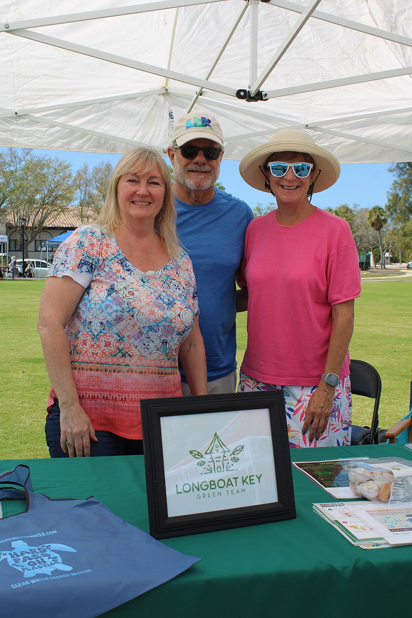 Linda and Aramis Velazquez and Pat Watral represent the Longboat Key Green Team at the open house.