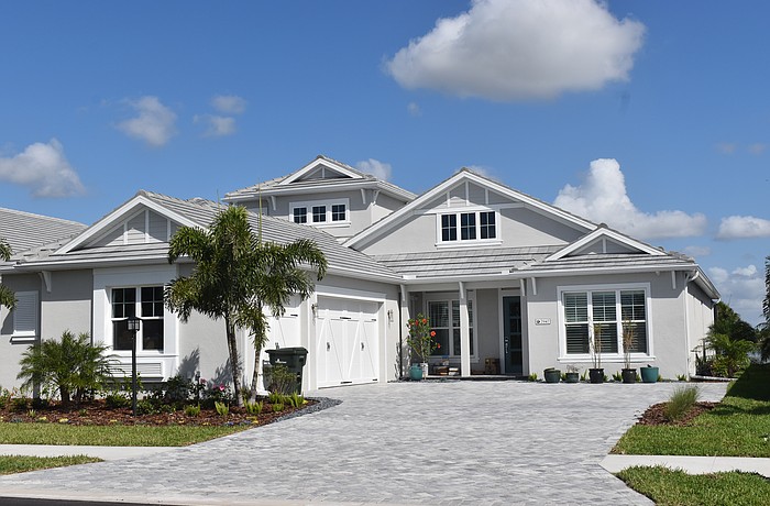 A Lakehouse Cove at Waterside home at 7947 Waterbend Trail sold for $1,827,000. Built in 2025, it has three bedrooms, four baths, a pool and
3,654 square feet of living area.