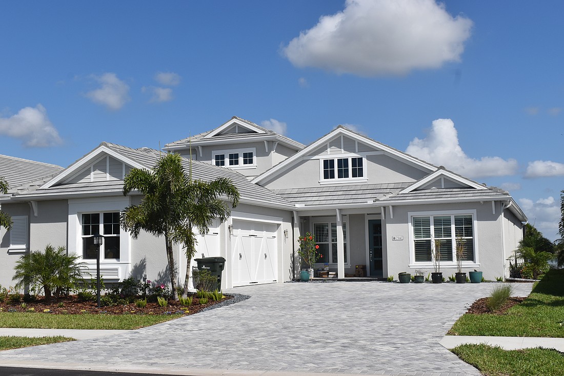 A Lakehouse Cove at Waterside home at 7947 Waterbend Trail sold for $1,827,000. Built in 2025, it has three bedrooms, four baths, a pool and
3,654 square feet of living area.