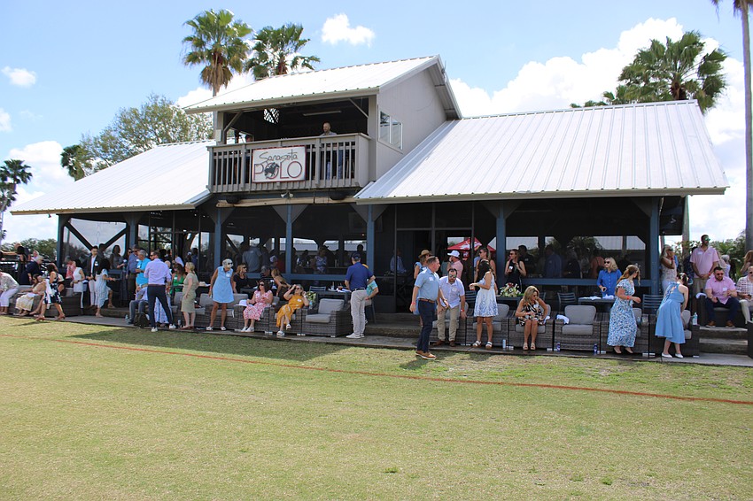 Guests of SMR’s party at the Sarasota Polo Club find their seats for the upcoming polo match.