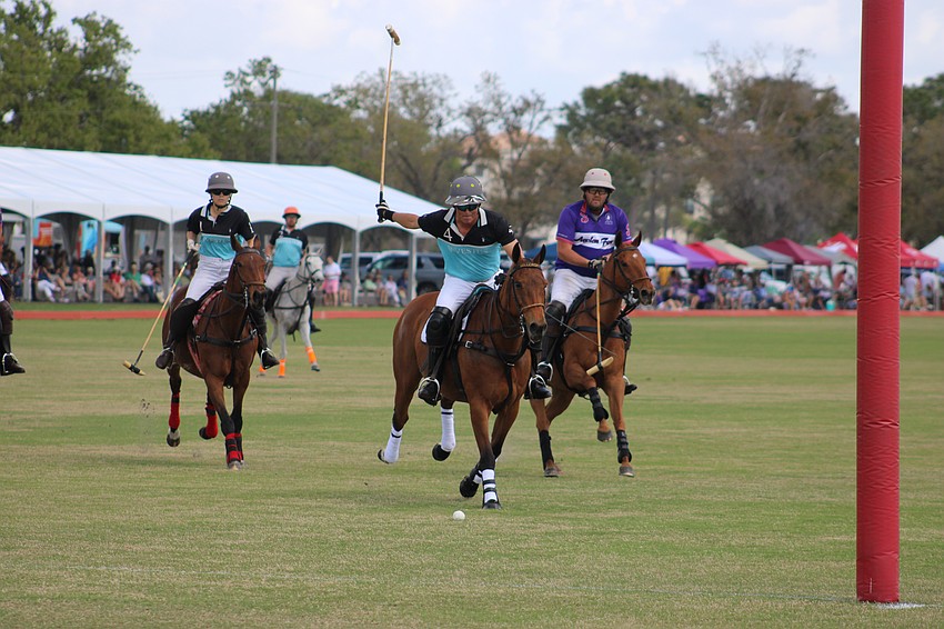 James Miller of Hillcroft/Investus gets ready to shoot and score during a match against Avalon Farms March 8 at the Sarasota Polo Club.