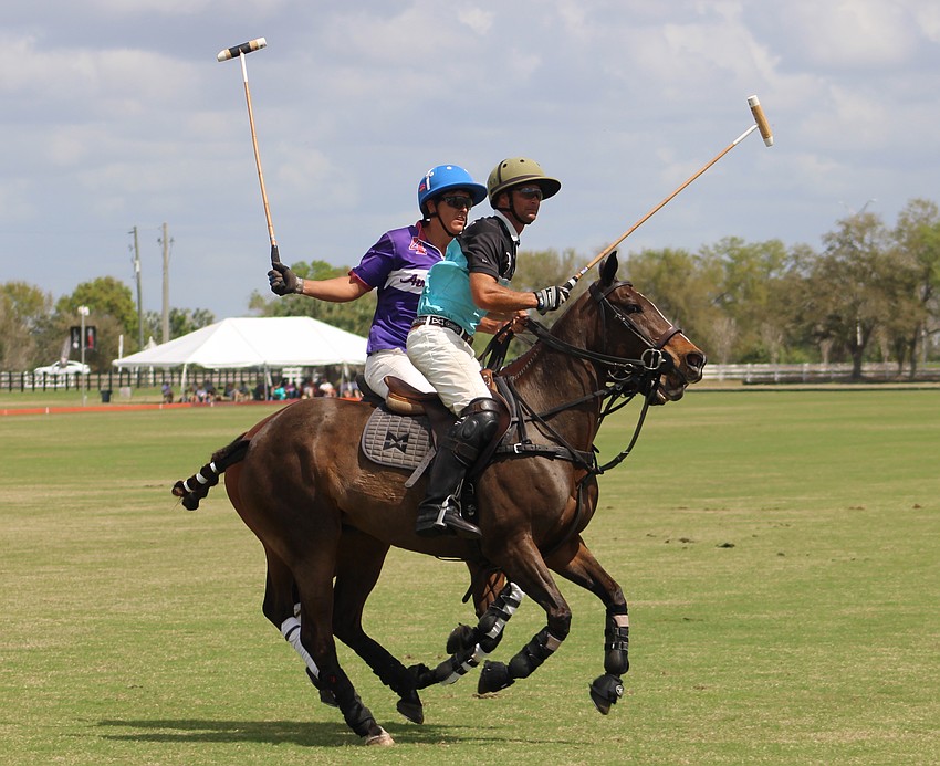 Martin Eddy of Avalon Farms and Mason Wroe of Hillcroft/Investus watch Wroe's shot at the Sarasota Polo Club March 8.