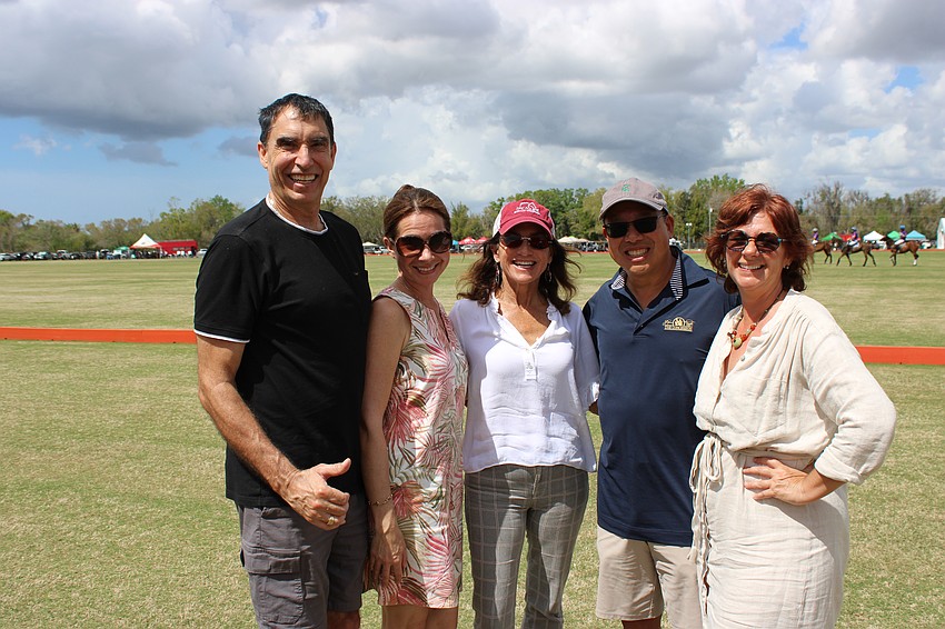 David Ways, Olga Ways, Jaymie Klauber, Filic Chung, and Laura Burns enjoy the action and tailgating at the Sarasota Polo Club.