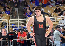 Blake Roulund was a defensive end/middle linebacker for Cardinal Mooney football as a junior. He committed to wrestling full-time for his senior year, forfeiting a chance to be part of a football state championship.