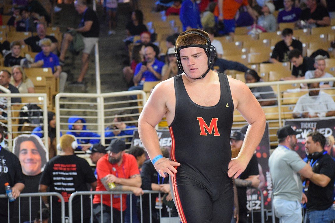 Blake Roulund was a defensive end/middle linebacker for Cardinal Mooney football as a junior. He committed to wrestling full-time for his senior year, forfeiting a chance to be part of a football state championship.