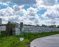 The city of Sarasota paved Industrial Court with heavy-duty concrete, the former dirt road leading to the entrance of U.S. Recycling.
