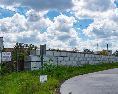 The city of Sarasota paved Industrial Court with heavy-duty concrete, the former dirt road leading to the entrance of U.S. Recycling.