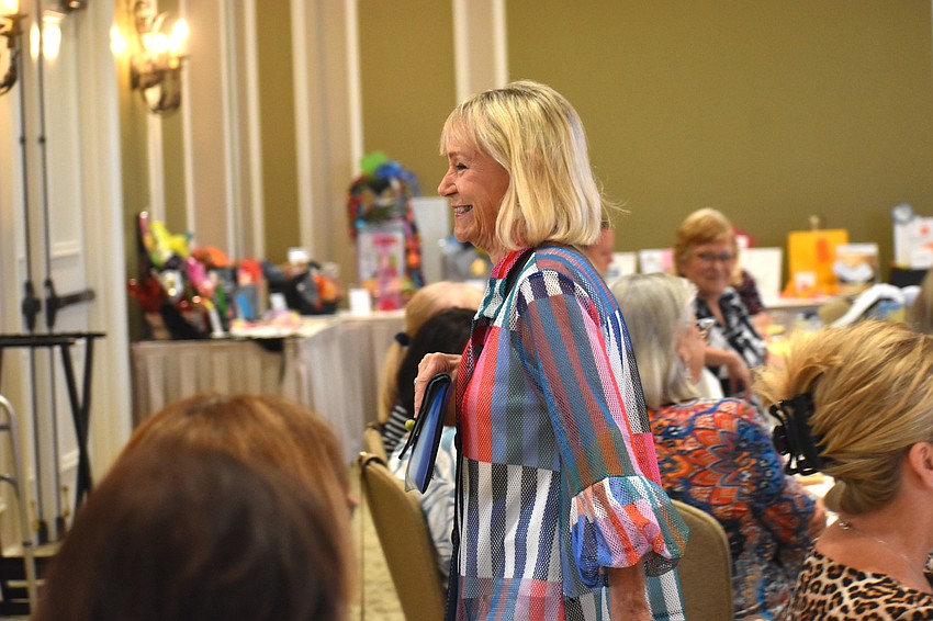 Molly Barrett, a member of Lakewood Ranch Women's Club for nine years, loves how all the women come together to give back to women and children in need.
