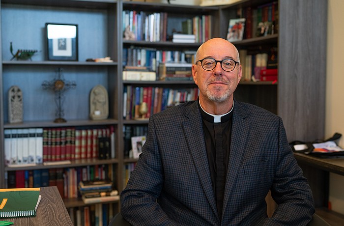 St. Armands Key Lutheran Church Pastor Ken Blyth poses for a photo in his office Tuesday, March 10, less than a week after he and a group of pastors had their pilgrimage to the Holy Land cut short as war erupted in the Middle East.