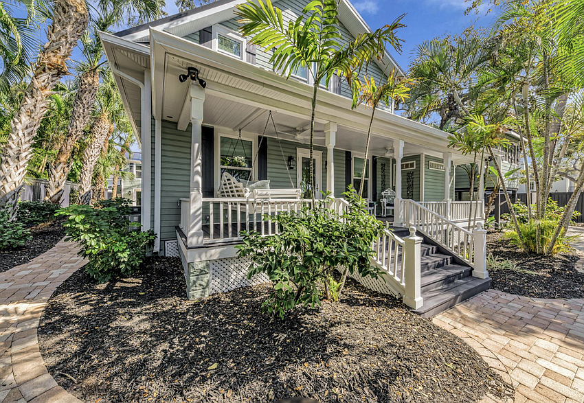 The home at 1611 Hyde Park St. includes about 3,600 square feet of living space, split between a main house and an apartment-sized garage space.