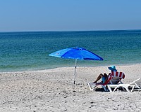 Beachgoers often bring umbrellas to protect themselves from the sun on beach days. Tents, however, are prohibited by town ordinance.