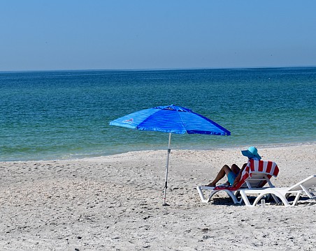 Beachgoers often bring umbrellas to protect themselves from the sun on beach days. Tents, however, are prohibited by town ordinance.