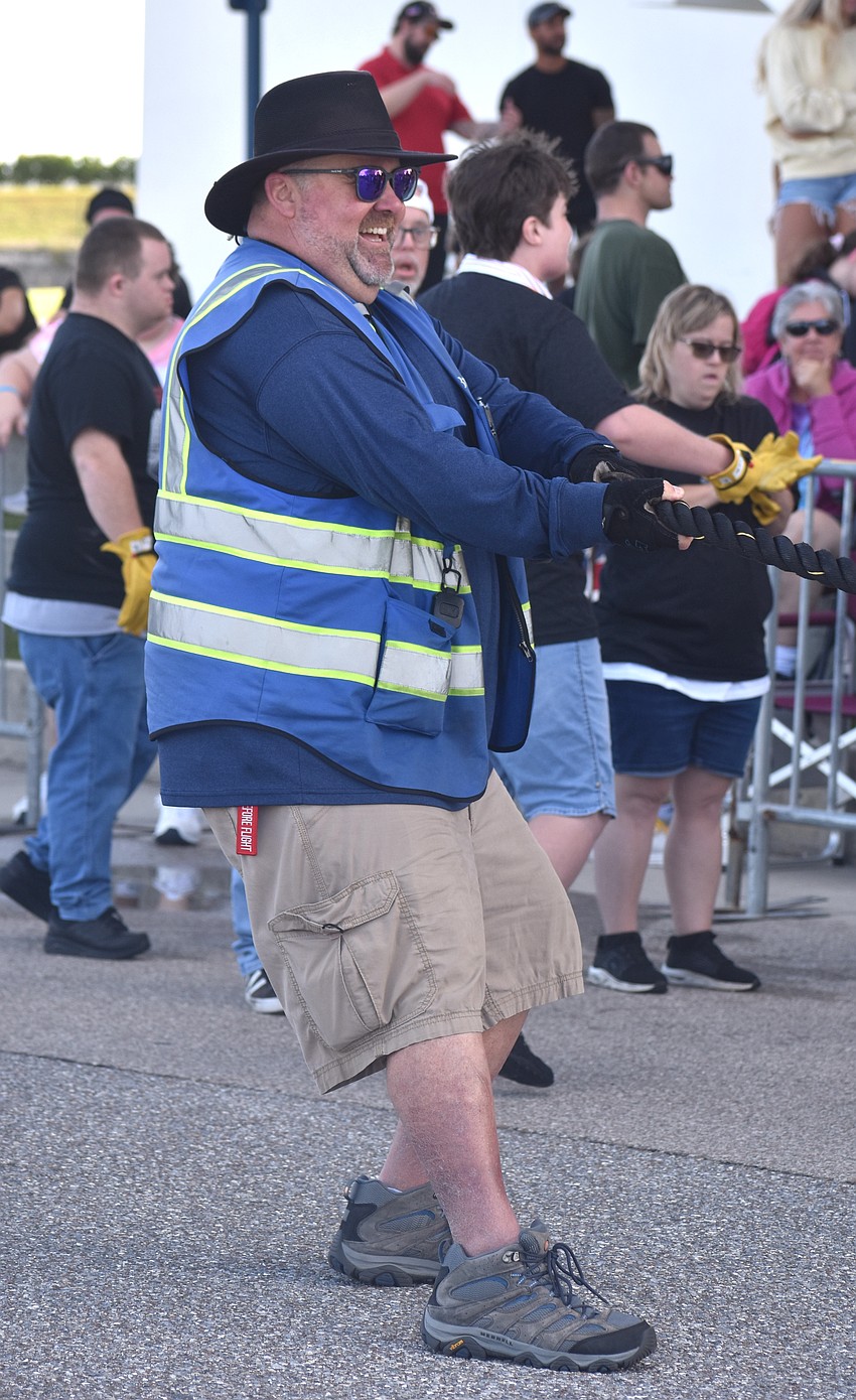 David Frayer, a transportation instructor with Breeze Transit, resets the rope before getting back in the bus for the next team to compete.