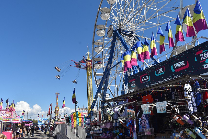The fair brought a carnival midway featuring a variety of rides.