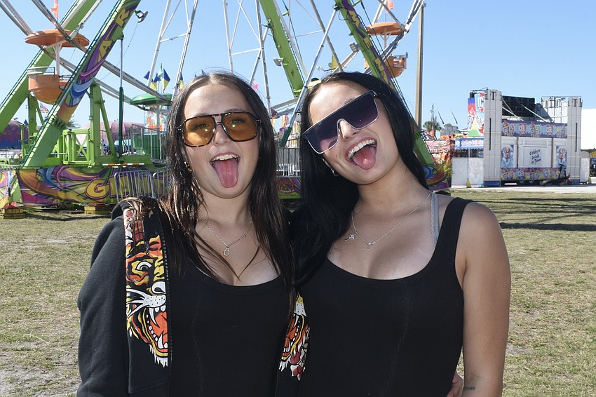 Charlie Paxton and her sister Cadence Paxton were having fun at the fair.
