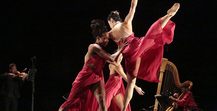 Former Boston Symphony Orchestra Ann Hobson Pilot plays the harp during Sarasota Contemporary Dance Company's tango-inspired program, "SCD + Piazzolla."
