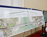 Longboat Key resident Cathy Ross looks at FDOT plans for a fixed-span bridge to replace the drawbridge currently connecting Longboat Key to Anna Maria Island at a public meeting at Christ Church Thursday, March 13.