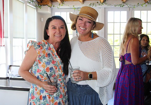 Ashley Dawson and Kristen Laviolette share what the Ladies of Longboat social group has meant to them as they greet members at the March 11 meetup at Ventura's Italian Kitchen & Wine Bar.