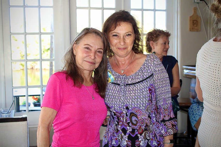 Agi Peterson and Irina LaRose catch up at the Ladies of Longboat social meetup on March 11 at Ventura's Italian Kitchen & Wine Bar.