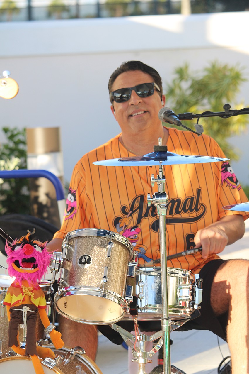 Aloha Sharks drummer Carmen D'Amico warms up.