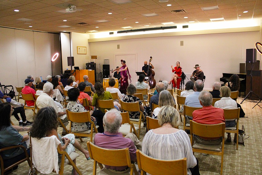 Music lovers attend The Education Center's final Sunday Performing Arts Program set of the season on March 15, listening to Los Rumberos.