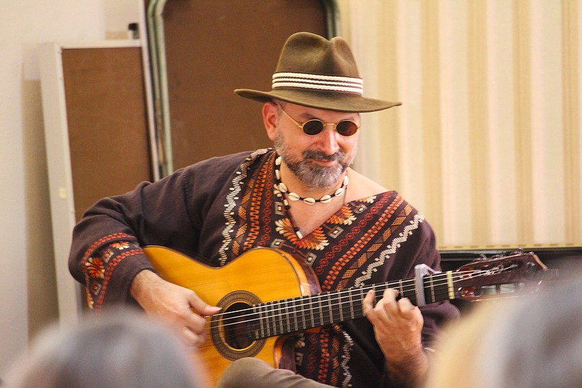 David Muñoz plays the flamenco guitar with Los Rumberos.