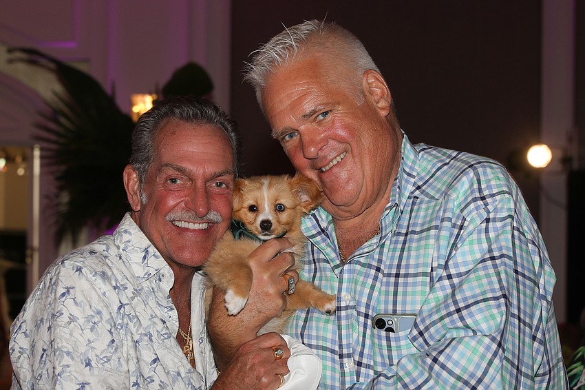 TJ Wicker and Todd Powers just increased their family size by one and their donation to HSSC garnered a thunderous a-paws.