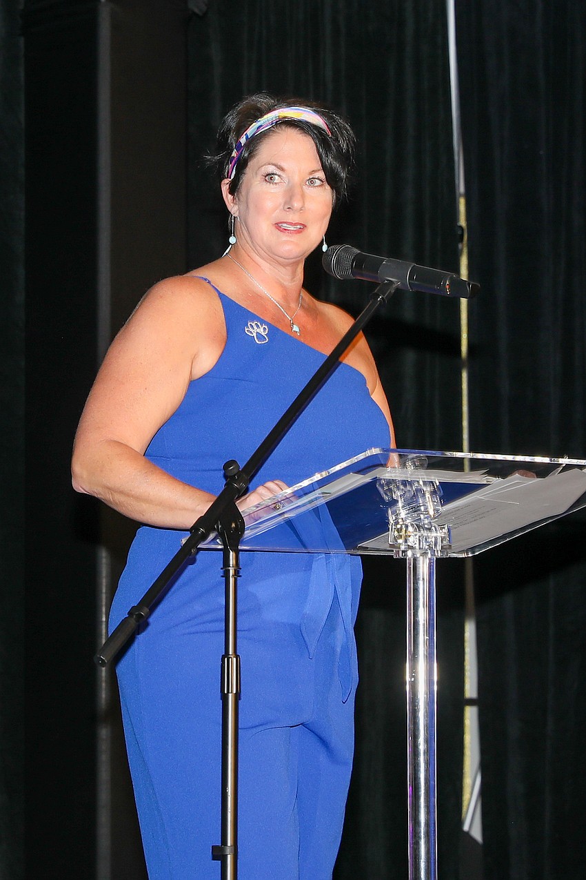 Executive Director Connie Boros addresses the guests with facts, figures and heart-warming stories.