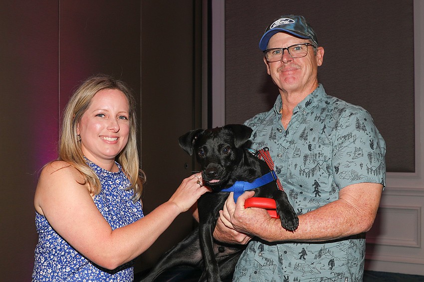 One year ago Humane Society medical director Dr. Ashley Gillett gave Bronco a blood transfusion during a bout with hookworm. Bronco was adopted by Earle Savage.