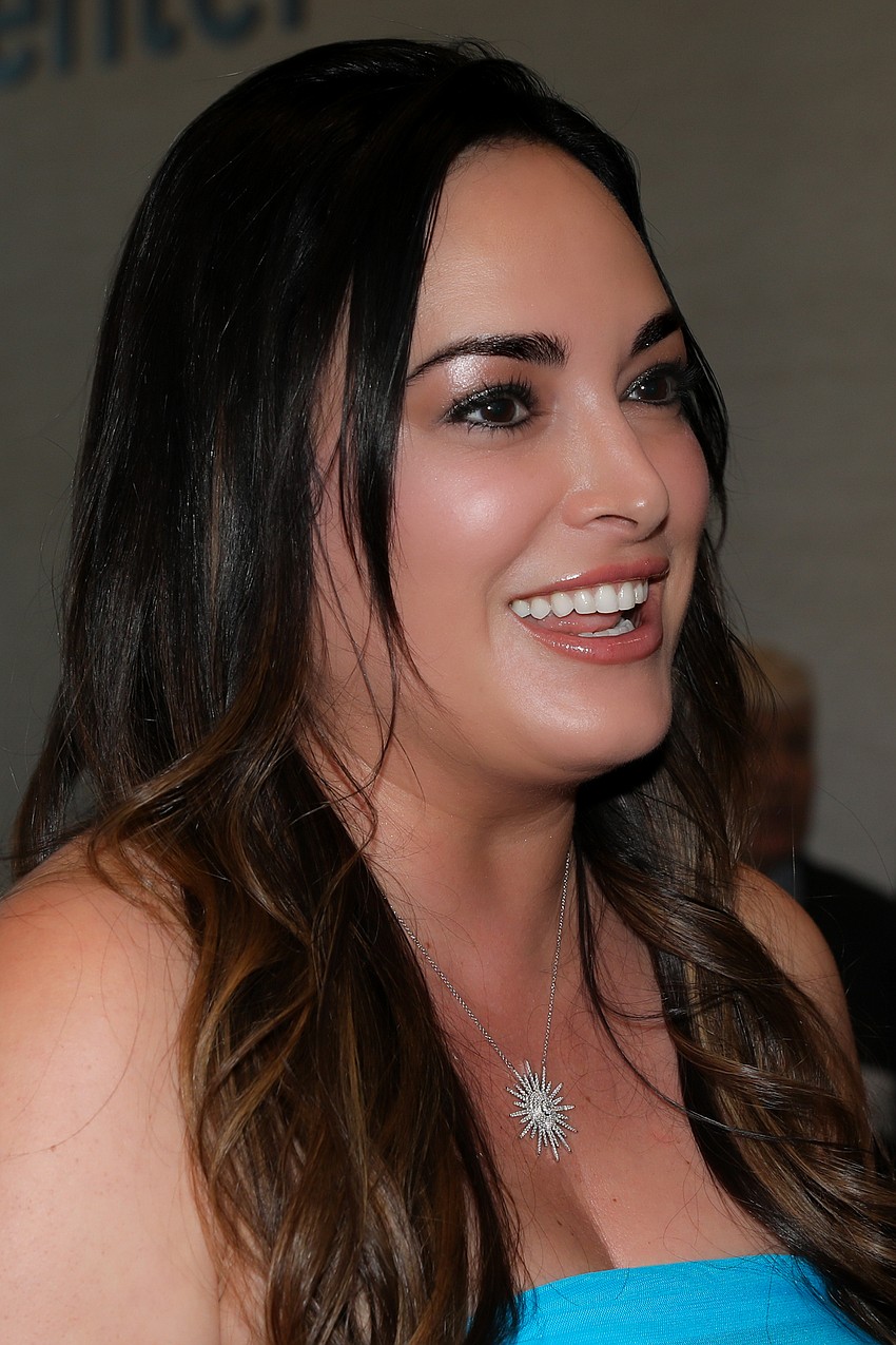 Sepi Ackerman catches up with friends during the cocktail hour at Aviva's annual event.