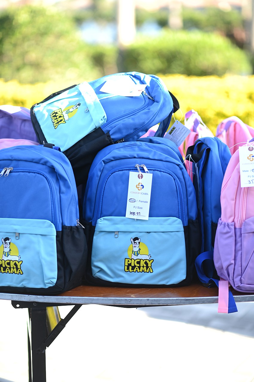 Backpacks are stuffed and ready to be delivered to area nonprofits to help foster kids.