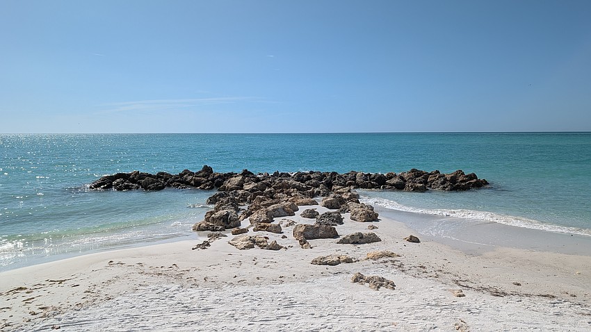 On the northern end of Longboat Key’s beach, a T-shaped beach groin is one of five groins installed during a 2021 beach renourishment project.