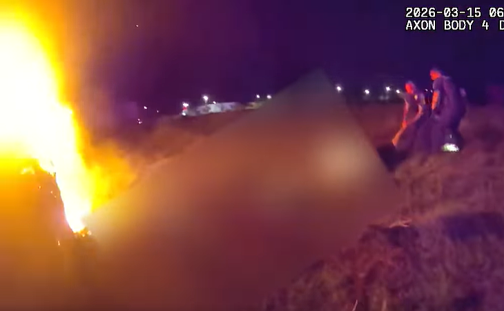 A suspect in a South Daytona police officer shooting is pulled from a burning vehicle. Courtesy of the Volusia County Sheriff's Office