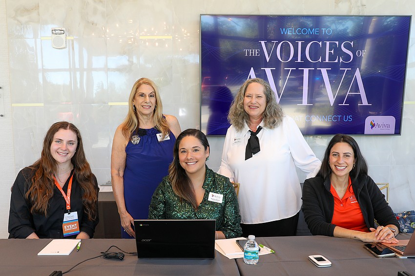 Dianna Johnson, Lorene Hagan, Nepheny Breton, Kellye Jacob and Tiffany Hernandez at the reception table for Voice of Aviva's annual gala.