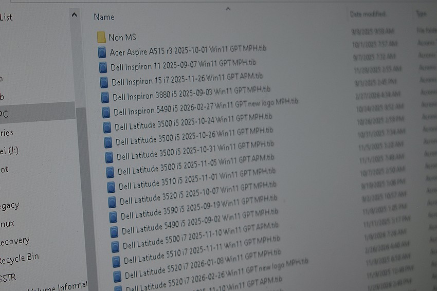A screen displays the images used for different laptop computers.