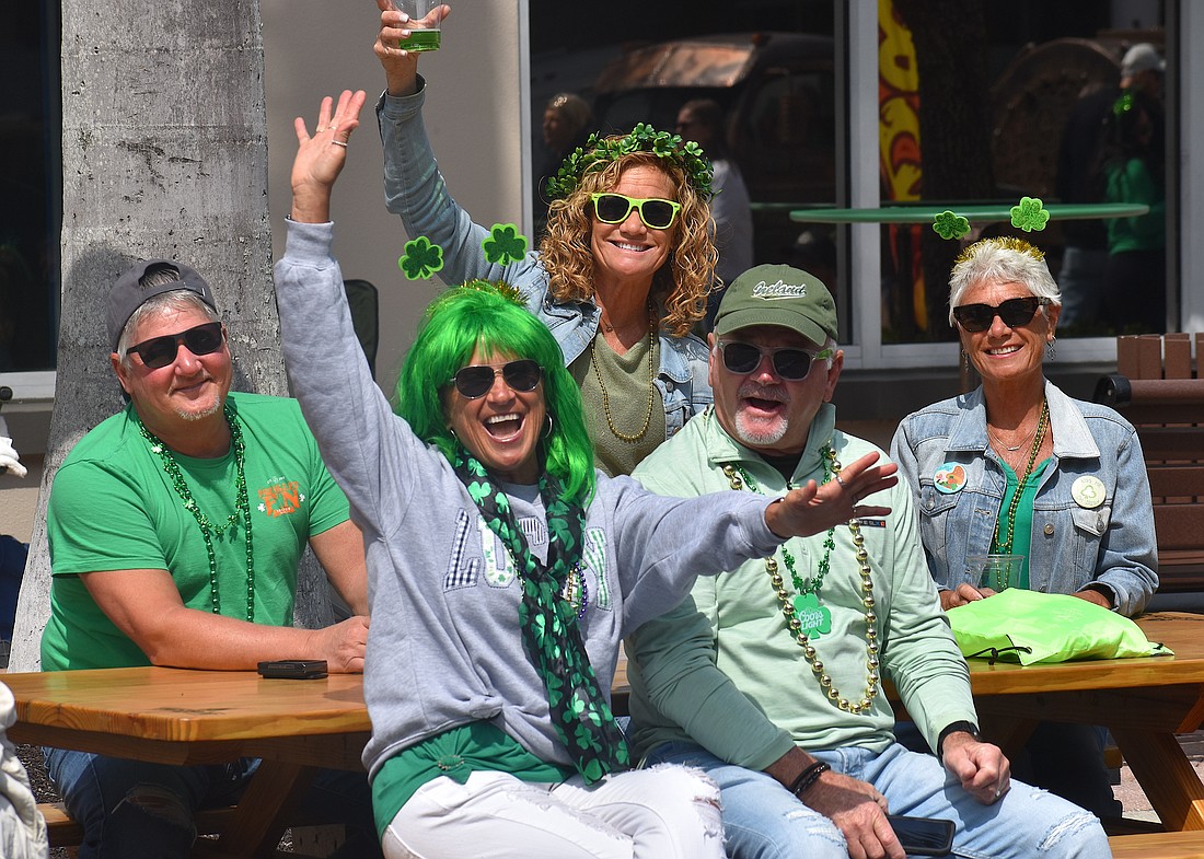 Sarasota's Tony Mullet, Dianne Gardner, Annelle Mullet,
Dave Gardner and Denise Miller get their green on to celebrate St. Patrick's Day on Lakewood Main Street on March 17.