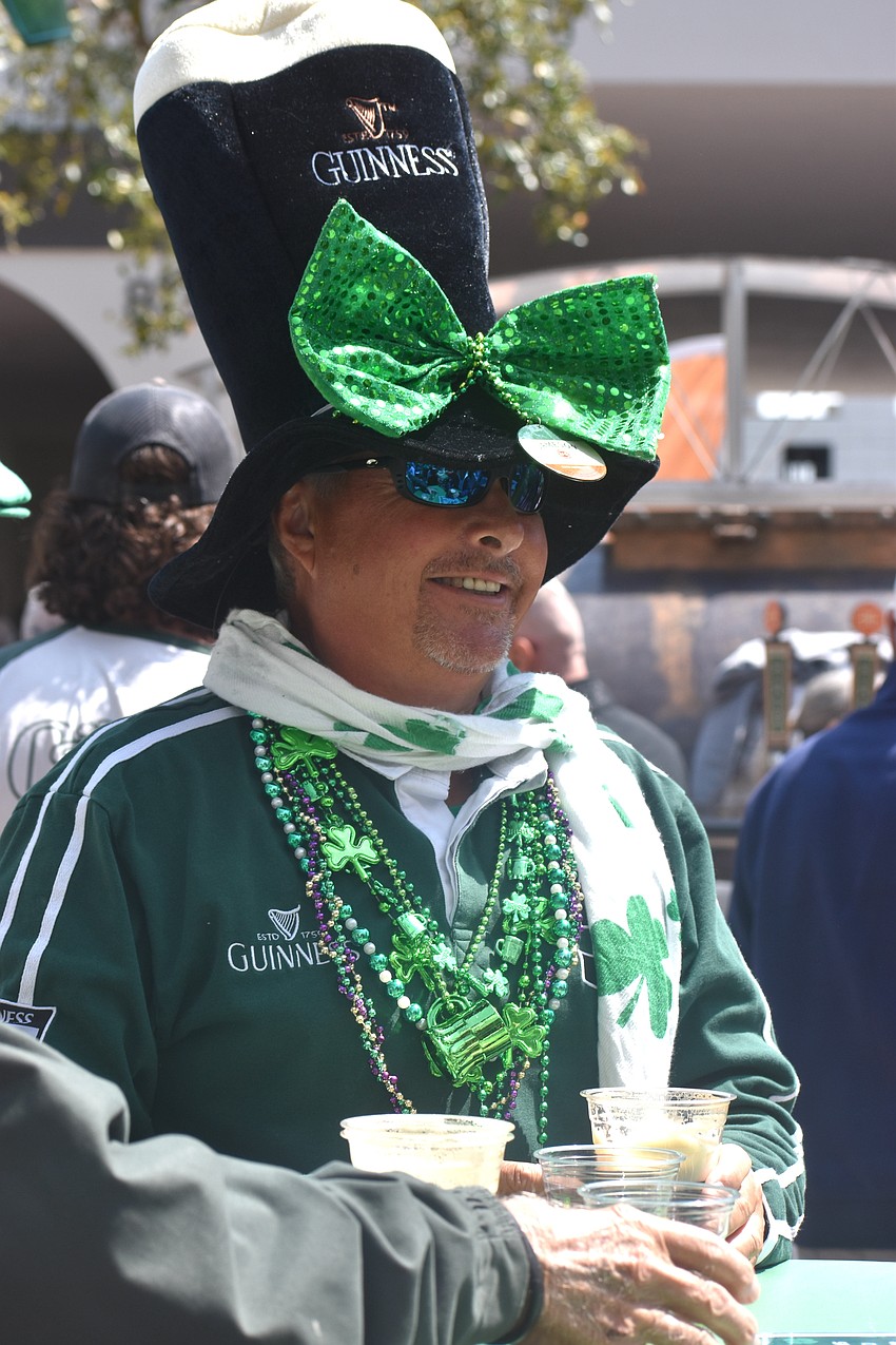 Lakewood Ranch's Bill Nicholson is in the St. Patrick's Day spirit with his Guinness-themed outfit and green accessories.
