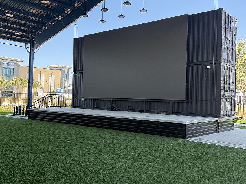 Developers installed a 30-by-16-foot flat-screen television as a central gathering spot for sporting events and movie nights at The Block Jax.