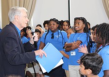 Ted Lindenberg thanks students from Rogers Garden Elementary for singing a couple songs during the Books for Kids annual luncheon at Lakewood Ranch Country Club March 12.