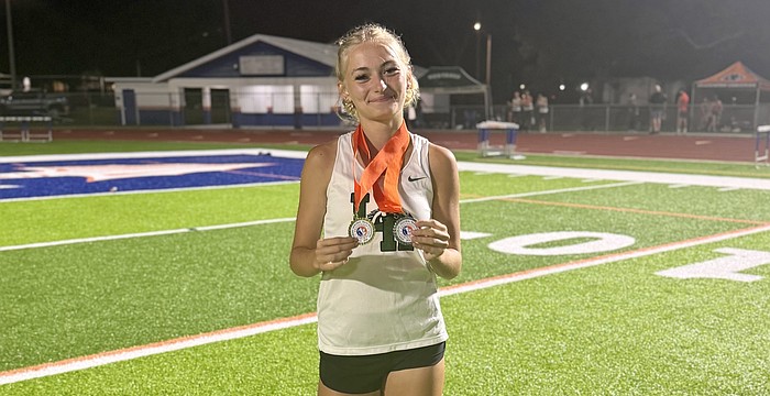 Jenna Jahn notched a pair of top-two finishes at the Eddie Starling Memorial Invite on March 13 — including a record-breaking performance.