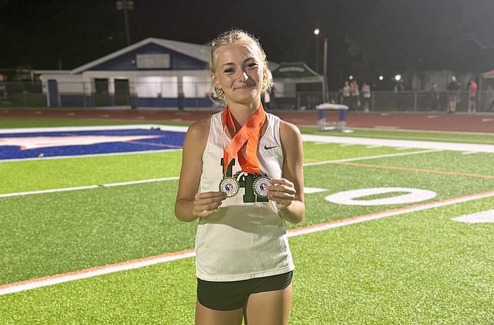 Jenna Jahn notched a pair of top-two finishes at the Eddie Starling Memorial Invite on March 13 — including a record-breaking performance.