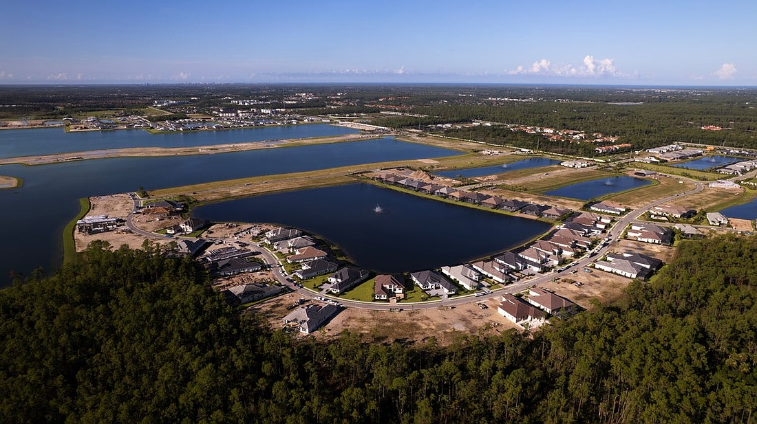 STOCK Luxury Homes and Pulte Homes are building 457 lakefront homes inside Caymas, a new resort-style community in Naples.