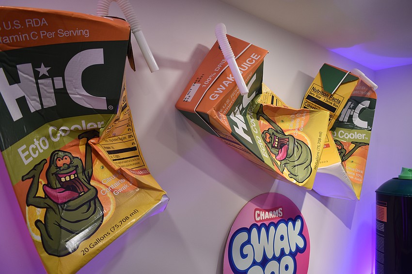 A series of giant Hi-C punch boxes adorn the wall of Benham's studio.