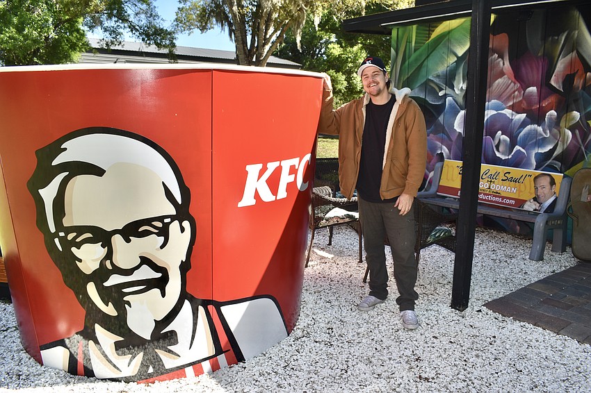 A KFC bucket serves as a hot tub outside the Vibe Villa.