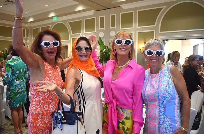 Lakewood Ranch's Kathleen Flesch, Sonia Levy, Jane Imperiale and Peri Ann Aptaker dress for the Palm Royale-themed Divas and Dogs fundraiser that will benefit The Humane Society at Lakewood Ranch.