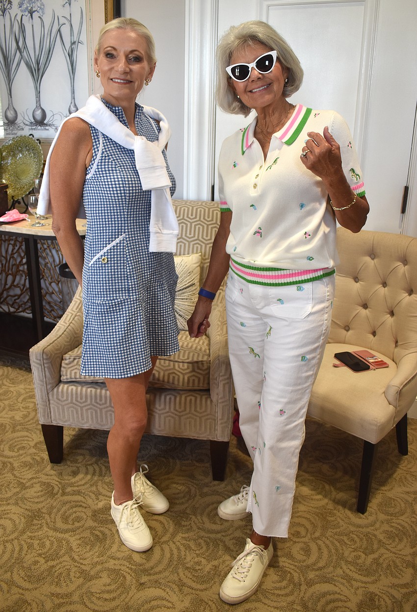 Lakewood Ranch's Susie Tesoriere and Nancy Kaltenbach are modeling for Divas and Dogs for the first time. They say it's lots of fun for a good cause.