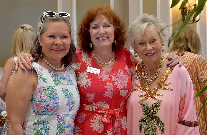 Lakewood Ranch's Johnna Sharp, Linda Dirk and Bonnie Frye are eager for the Divas and Dogs fashion show to begin. Dirk has been a volunteer for The Humane Society at Lakewood Ranch for 14 years.