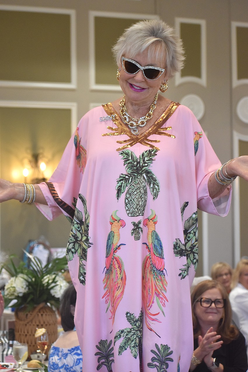 Lake Club's Bonnie Frye wins the best themed outfit award by getting the most and loudest claps from the audience.