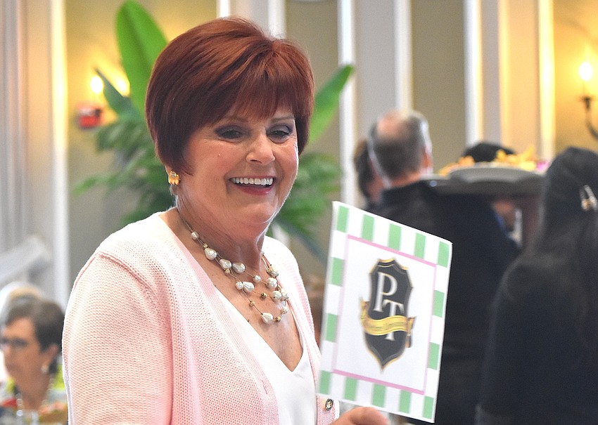 Model Cathy Adragna says she has walked the runway for Divas and Dogs for eight years and sees it as a way to socialize while helping animals in need.